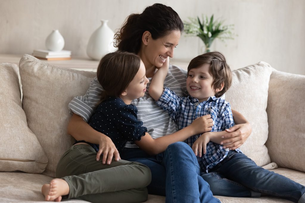 Happy mom with two children